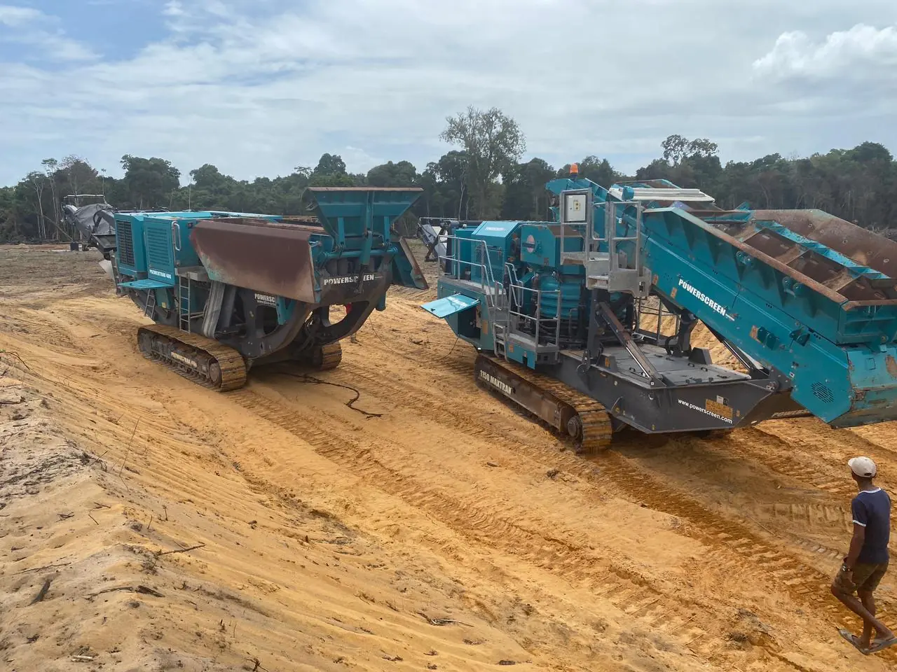 The two Powerscreen 1150 Maxtrak units — jaw and cone — set up side by side after commissioning.